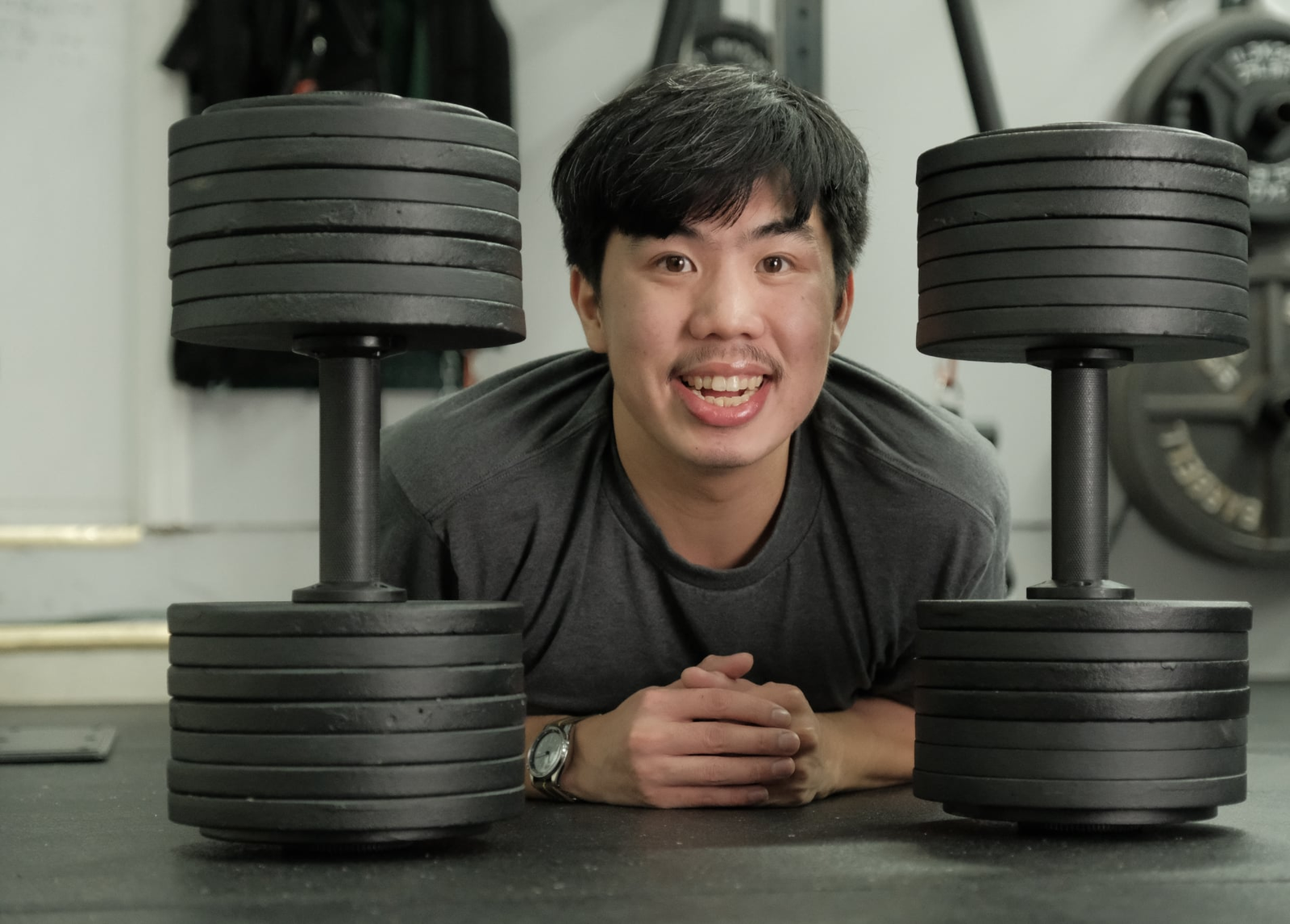 Premium home gym with REP Fitness power rack, barbell, and adjustable bench
